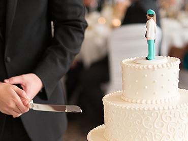 Katie & Drew cut their gorgeous wedding cake during their reception at the Inn at St. Johns in Plymouth, Michigan